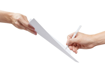 Hand signing paper offered by the other hand, isolated on white background