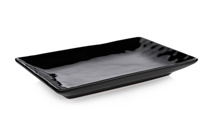 Black plate isolated on white background.