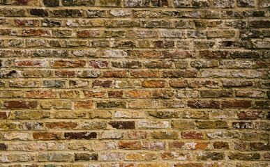 Old brick wall texture as a background. Abstract backdrop