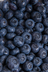  Clean freshly picked blueberries - close up studio shot. ( Ingredients:  Antioxidants , Vitamin C, Antioxidant)