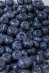  Clean freshly picked blueberries - close up studio shot. ( Ingredients:  Antioxidants , Vitamin C, Antioxidant)