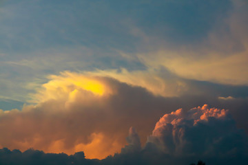 Fototapeta premium sunset orange cloud sunshine in dark sky soft cloud