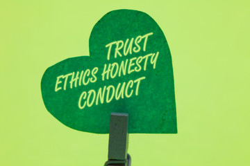 Conceptual hand writing showing Trust Ethics Honesty Conduct. Business photo showcasing connotes...