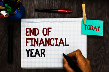 Conceptual hand writing showing End Of Financial Year. Business photo text Revise and edit...