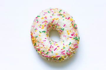 Donut with bright sprinkles on a isolated background, food concept