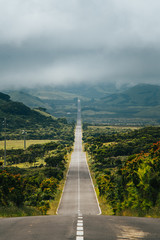 Endless road into the cloudy mountains & hills of Pico Island, Azores, Portugal