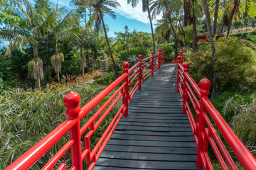 red fence pathway