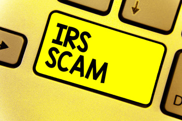 Writing note showing Irs Scam. Business photo showcasing targeted taxpayers by pretending to be Internal Revenue Service Keyboard yellow Intention create computer computing reflect document