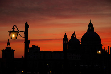 Fototapeta premium Venice winter mysterious romantic: The Basilica of Santa Maria della Salute at sunset