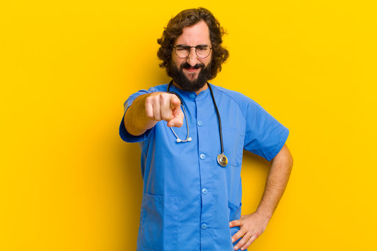 Young Nurse Man Pointing At You