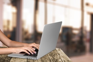 Fototapeta premium Woman Working with Laptop on background, close-up