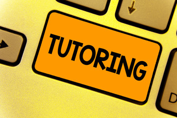 Word writing text Tutoring. Business concept for An act of a person employed to administer knowledge to someone Keyboard yellow key Intention create computer computing reflection document