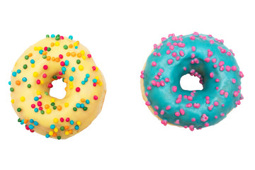 Blue and yellow donuts, two donuts with bright sprinkles, isolated, background, food concept