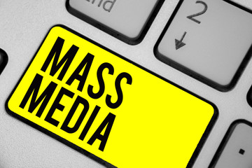 Word writing text Mass Media. Business concept for Group people making news to the public of what is happening Keyboard yellow key Intention create computer computing reflection document