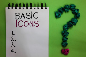 Text sign showing Basic Icons. Conceptual photo pictogram or ideogram displayed on a computer screen or phone Open notebook crumpled papers forming question mark green background