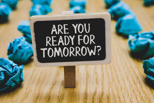 Handwriting text writing Are You Ready For Tomorrow question. Concept meaning Preparation to the future Motivation Stand blackboard with white words behind blurry blue paper lobs woody floor