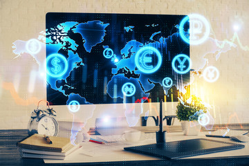 Financial graph colorful drawing and table with computer on background. Double exposure. Concept of...