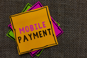 Text sign showing Mobile Payment. Conceptual photo Cashless Payment made through portable electronic devices Paper notes Important reminders Communicate ideas messages Jute background