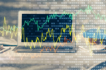 Double exposure of forex chart and work space with computer. Concept of international online trading.