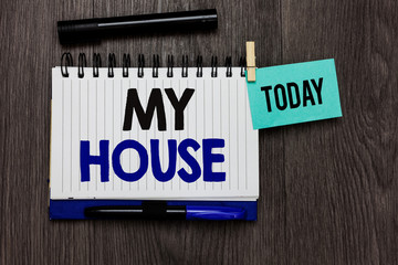 Conceptual hand writing showing My House. Business photo text A place or building where i live with the people whom i loved Ideas notebook wooden table markers for today important reminder