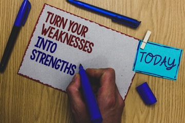 Conceptual hand writing showing Turn Your Weaknesses Into Strengths. Business photo text work on...