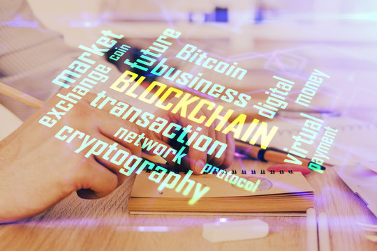 Man's hands working with notes background. Cryptocurrency and finance concept. - Powered by Adobe