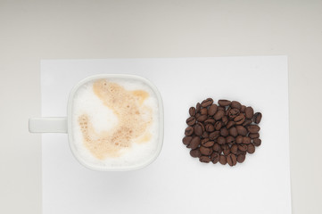cup of coffee and coffe bean
