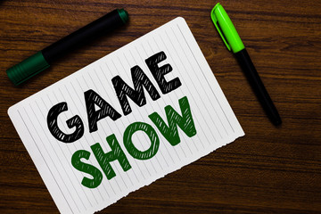 Conceptual hand writing showing Game Show. Business photo text Program in television or radio with...