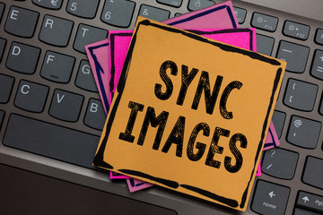Conceptual hand writing showing Sync Images. Business photo showcasing Making photos identical in all devices Accessible anywhere Papers keyboard Inspiration communicate Annotations computer