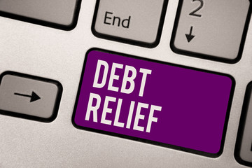 Conceptual hand writing showing Debt Relief. Business photo showcasing partial or total remission...