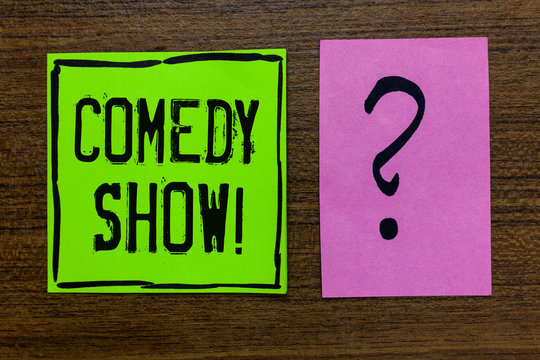 Handwriting text Comedy Show. Concept meaning Funny program Humorous Amusing medium of Entertainment Green paper note Important reminder pink question mark wooden background