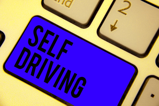Handwriting text Self Driving. Concept meaning Autonomous vehicle Ability to navigate without human input Keyboard blue key Intention create computer computing reflection document