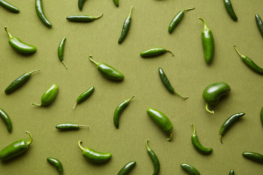 Arrangement of green chili peppers
