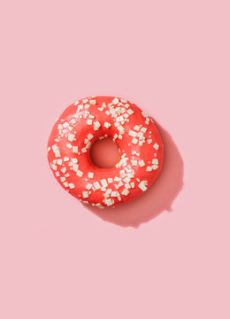 Delicious donut on pink