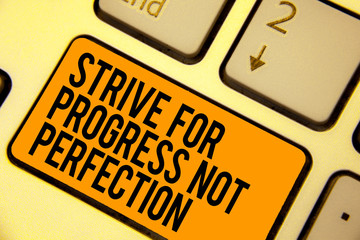 Handwriting text writing Strive For Progress Not Perfection. Concept meaning Improve with...