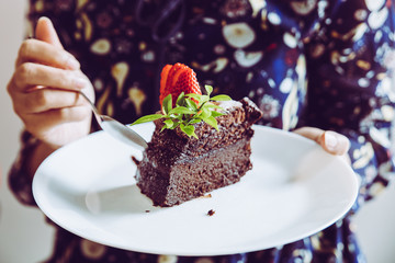 Chocolate cake with strawberry.