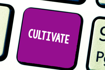 Text sign showing Cultivate. Conceptual photo prepare and use land for crops gardening grow or maintain Keyboard key Intention to create computer message, pressing keypad idea