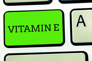 Writing note showing Vitamin E. Business photo showcasing Antioxidant Protects body tissue from damage caused by substances.
