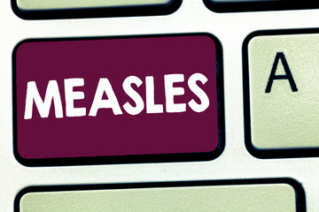 Text sign showing Measles. Conceptual photo Infectious viral disease causing fever and a red rash...