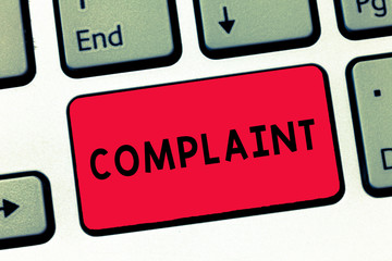 Text sign showing Complaint. Conceptual photo statement that something is unsatisfactory or unacceptable Keyboard key Intention to create computer message, pressing keypad idea