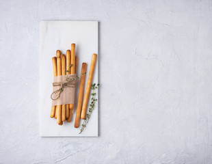italian stick bread grissini traditional  on gray beton