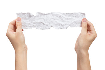 Hands holding a crumpled piece of paper, isolated on white background