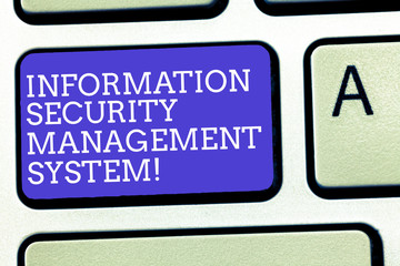 Fototapeta premium Text sign showing Information Security Management System. Conceptual photo IT safety secure technology Keyboard key Intention to create computer message, pressing keypad idea