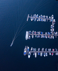 Deatil of pier with boats and yachts in marina