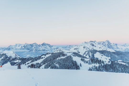 View over snowy mountains at dusk, Saalbach Hinterglemm, Pinzgau, Austria