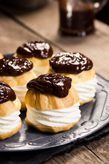 Cream Puffs or Profiteroles, Filled with Pastry Cream and Topped With Chocolate Ganache