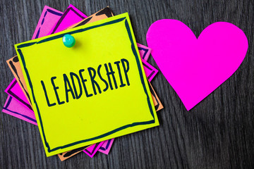 Handwriting text writing Leadership. Concept meaning Ability Activity involving leading a group of people or company Border sticky remember cards love heart pinned dark woody background