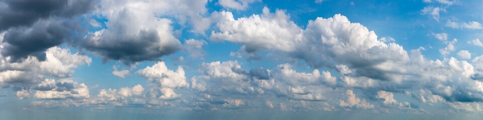 Fantastic soft clouds against blue sky, natural composition - panorama