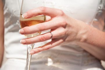 Wedding celebration holding a glass of Champaign 