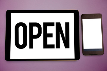 Writing note showing Open. Business photo showcasing Allow things to pass through or for immediate use Contrary of closed Wide framed white smart screen tablet text messages communicate idea